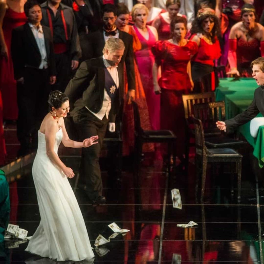 Elena Tsallagova as Violetta Valéry, Derek Welton as Baron Douphol, Matthew Newlin as Alfredo Germont