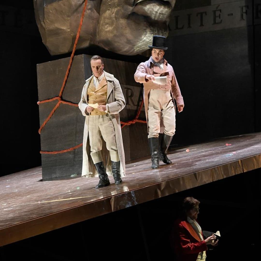 Ievgen Orlov as Roucher, Martin Muehle as Andrea Chenier, Clemens Bieber as Incroyable
Bettina Stöß
